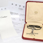 Cartier Pompon Panthere Pendant 18K White Gold Diamond 
Emerald on Cord Box/Ser