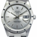 Rolex Date Steel Silver Dial Engine Turned Bezel 34mm Watch D 15210