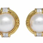 0.32 Carat Diamond 
Mabe Pearl 
18k Yellow Gold Earrings