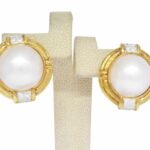 0.32 Carat Diamond 
Mabe Pearl 
18k Yellow Gold Earrings