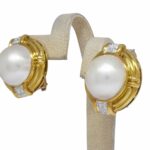 0.32 Carat Diamond 
Mabe Pearl 
18k Yellow Gold Earrings