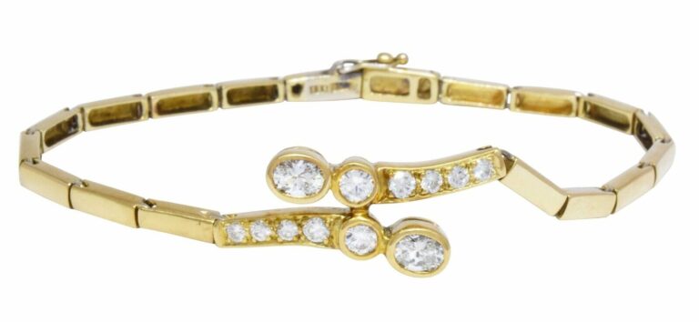 18k YG  BRACELET WITH APPROX. 1.25CT. DIAMONDS. BEZEL 
PAVE SET 6.75 in