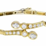 18k YG  BRACELET WITH APPROX. 1.25CT. DIAMONDS. BEZEL 
PAVE SET 6.75 in