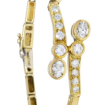 18k YG  BRACELET WITH APPROX. 1.25CT. DIAMONDS. BEZEL 
PAVE SET 6.75 in