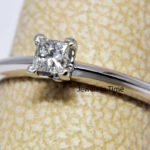 Tiffany 
Co. 0.17 Carat Princess Cut Diamond 
Platinum Ring 
Box Size 6