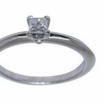 Tiffany 
Co. 0.17 Carat Princess Cut Diamond 
Platinum Ring 
Box Size 6