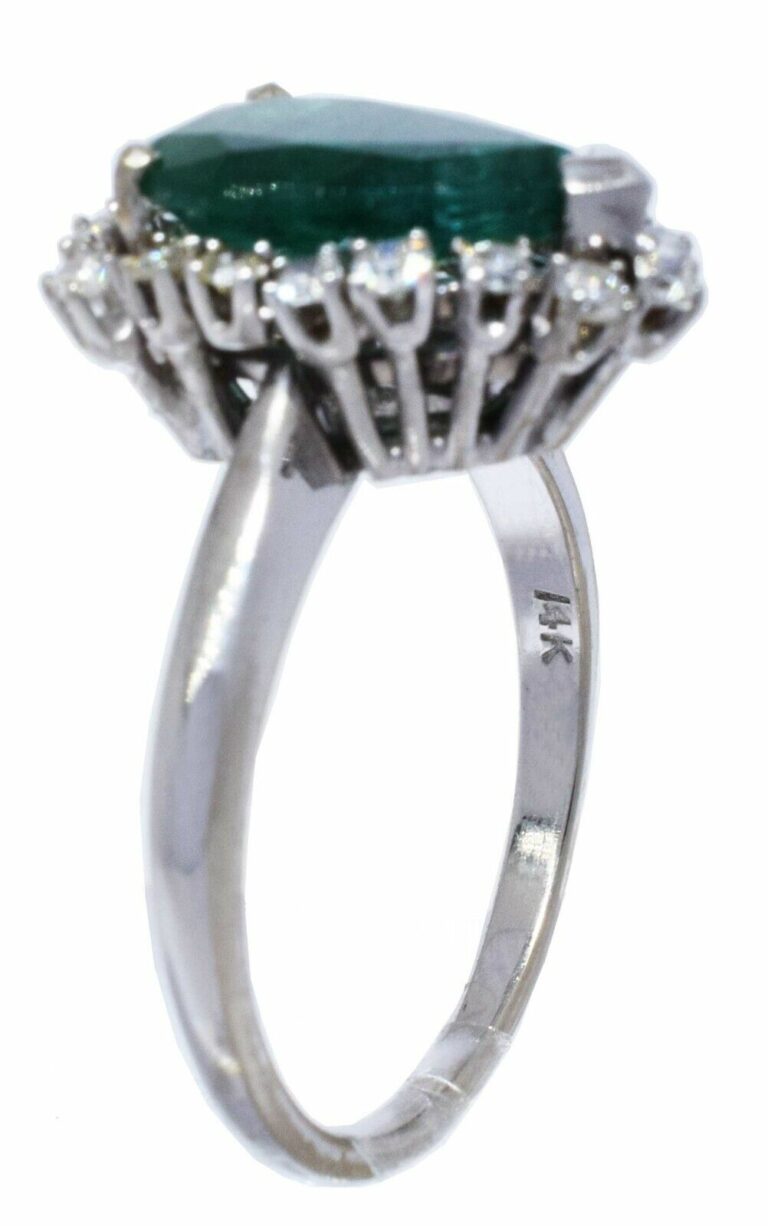 Ladies 14K White Gold Diamond 
Emerald Ring 7.25