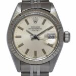 Rolex Date Steel 
Gold Bezel Silver Dial Ladies 26mm Vintage Watch '79 6917